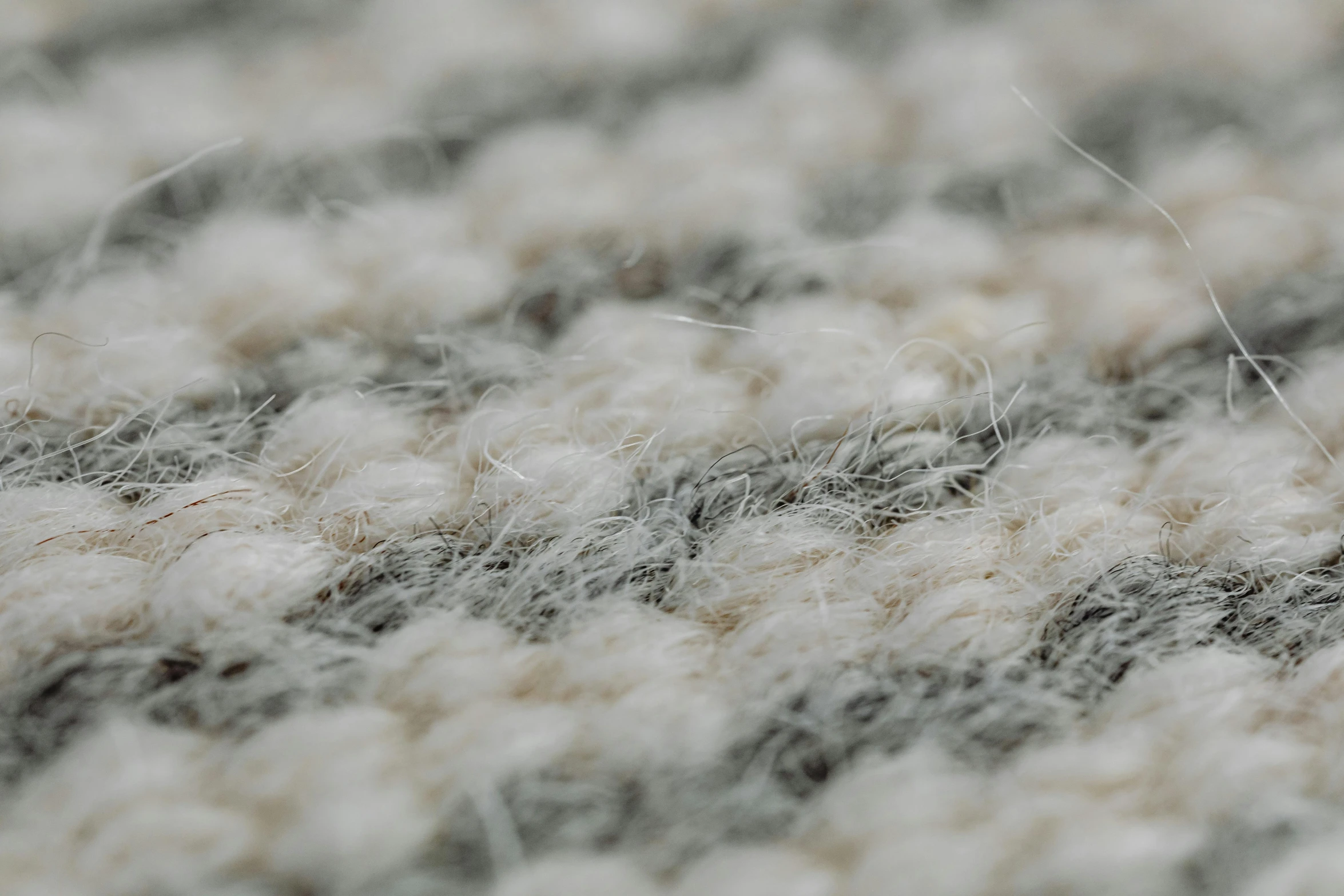 white fluffy carpet that is mostly black and white