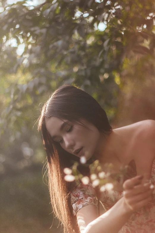 a woman that is standing in the grass