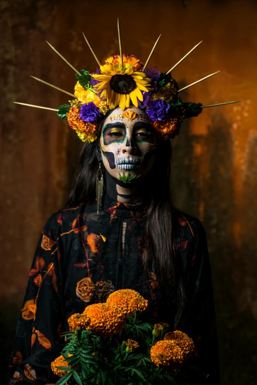 a woman with white and yellow face makeup on