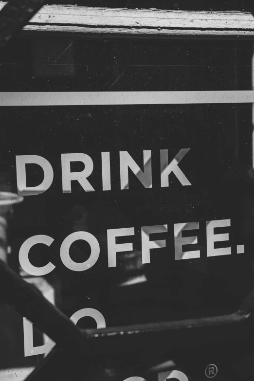 a sign outside is shown showing drink coffee