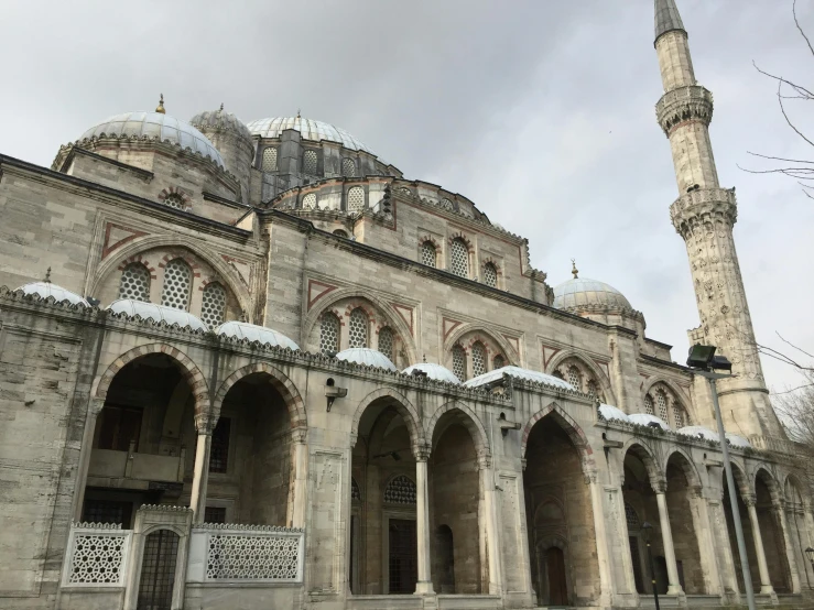 a large, ornate building with two minarets on the roof