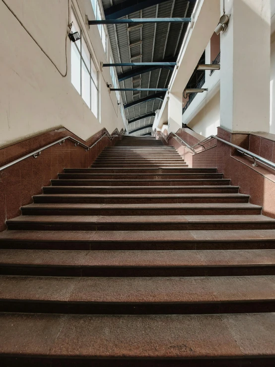 a view of a hallway looking down at several stairs