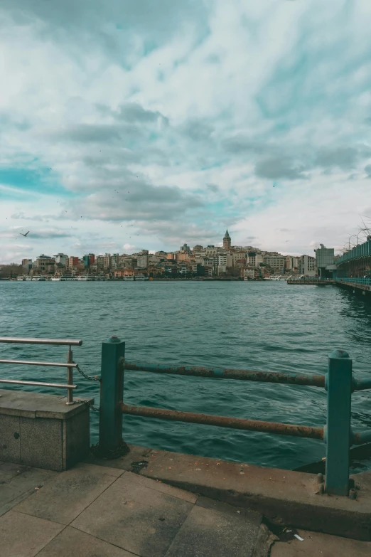 the city is covered with dark clouds and water