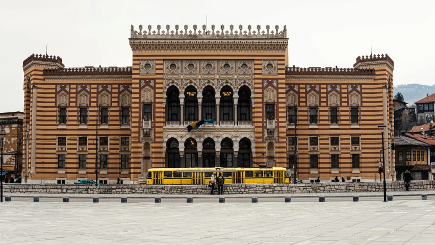 there is a large building in the middle of a street