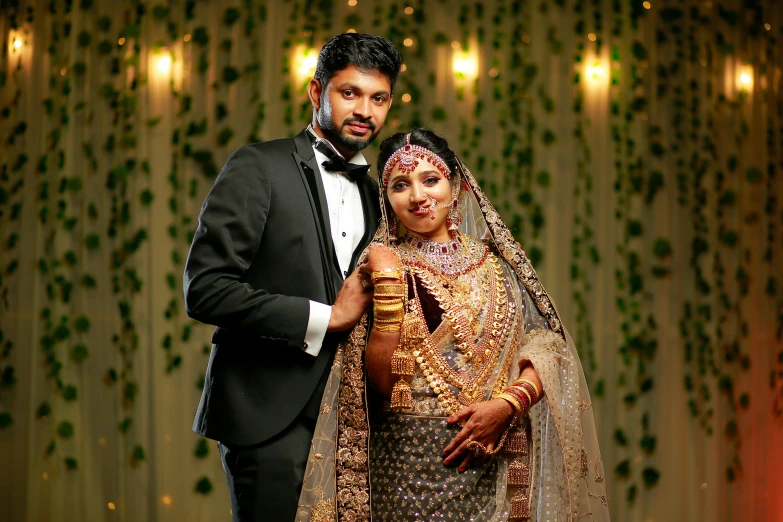 a bride and groom are posing for the camera