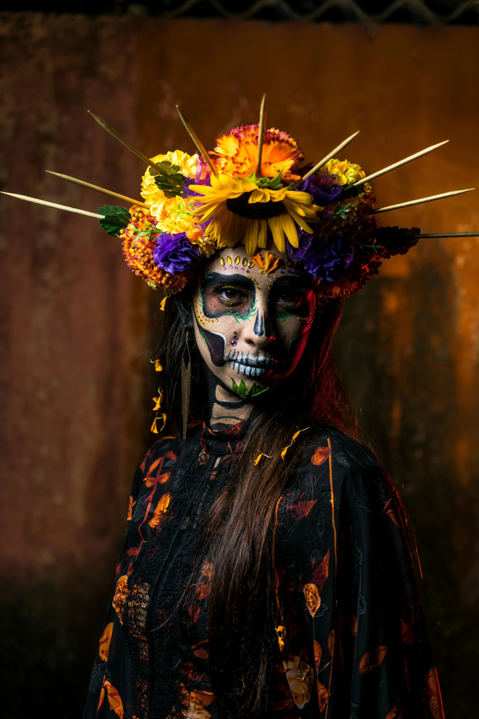 a girl wearing painted flowers in her hair