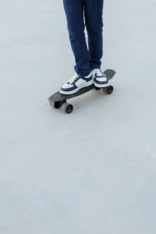 a person on a skateboard in the snow