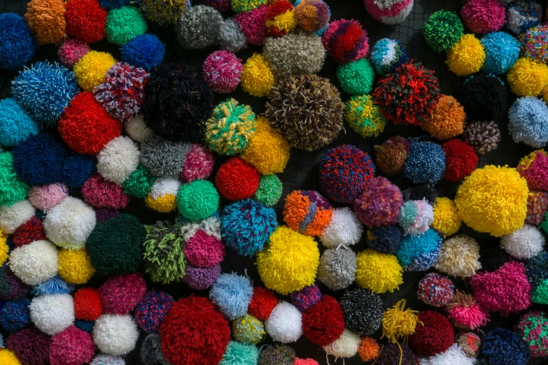 many colored balls are arranged up together