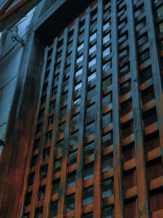 the old wooden gate is rusted and ready for repair