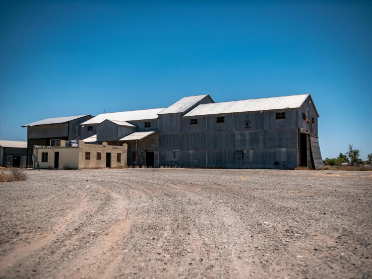 a picture of a barn and some houses