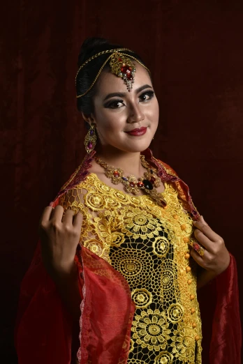 a woman with very elaborate make up is posing for a picture