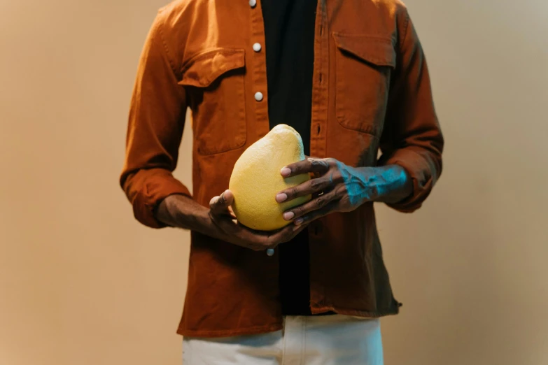 a person holding an object in their hands