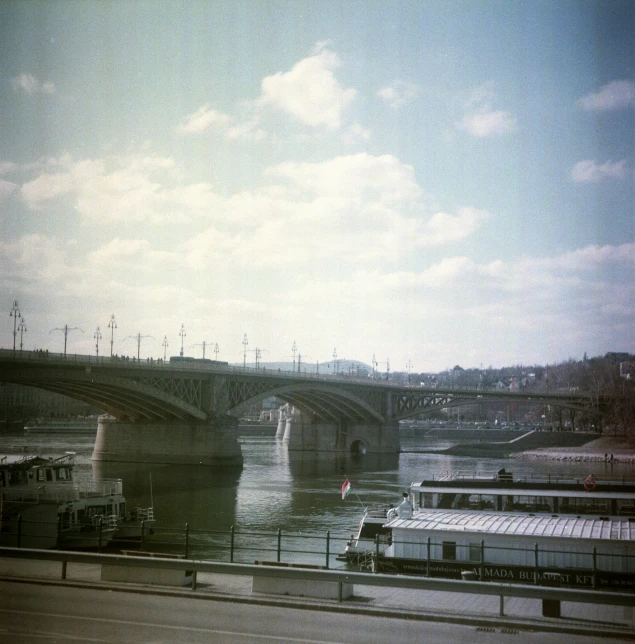 the train crosses the bridge and goes under it