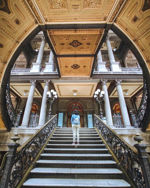 a very long beautiful set of stairs in a building