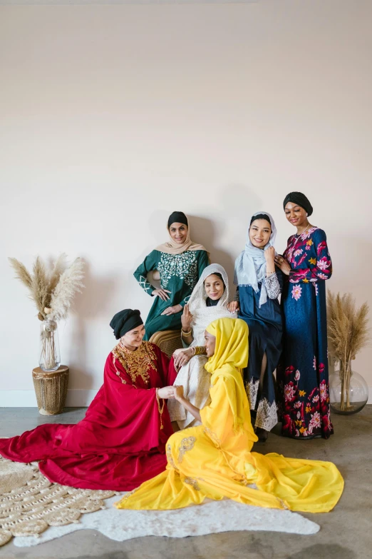 an oriental family poses for a po before getting married