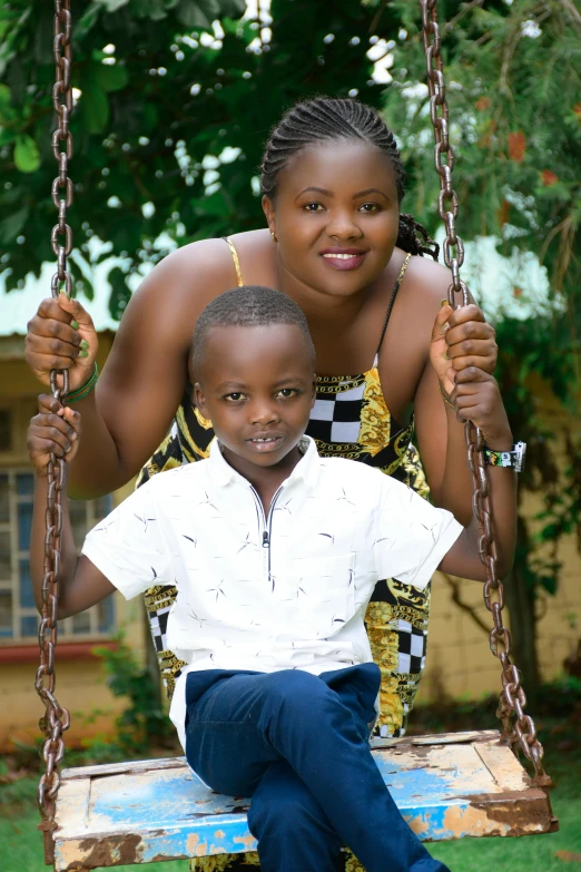 two women and a boy smiling for the camera