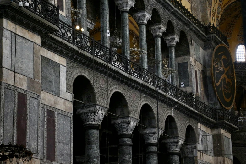 the balcony of an old building is decorated with artistic wrought ironwork