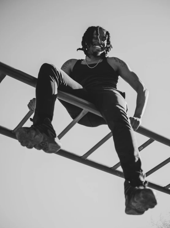 a skateboarder is doing a trick on a metal structure