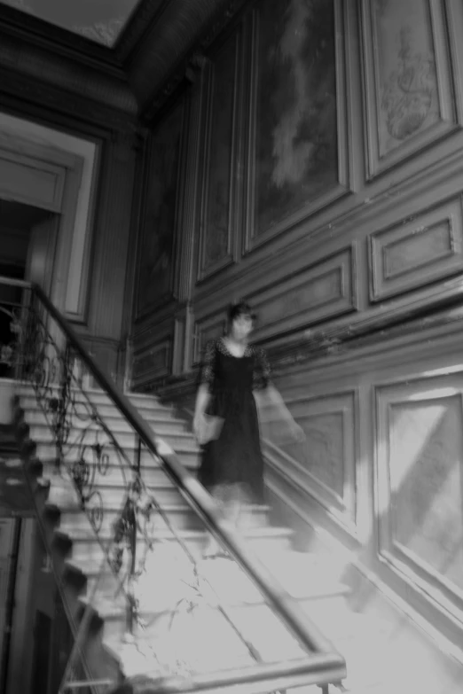 vintage po of a lady on the stairs