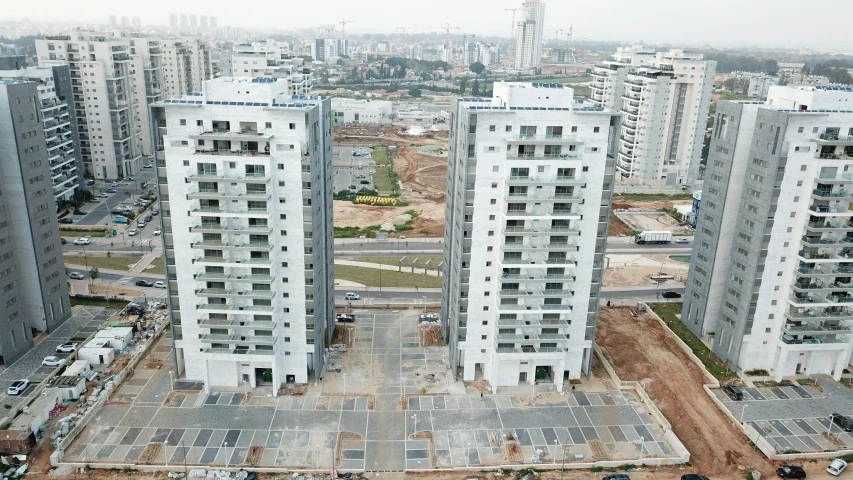 an aerial view of some high rise buildings