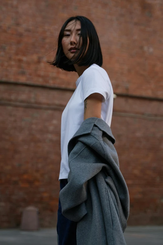 an image of a woman with a scarf around her neck