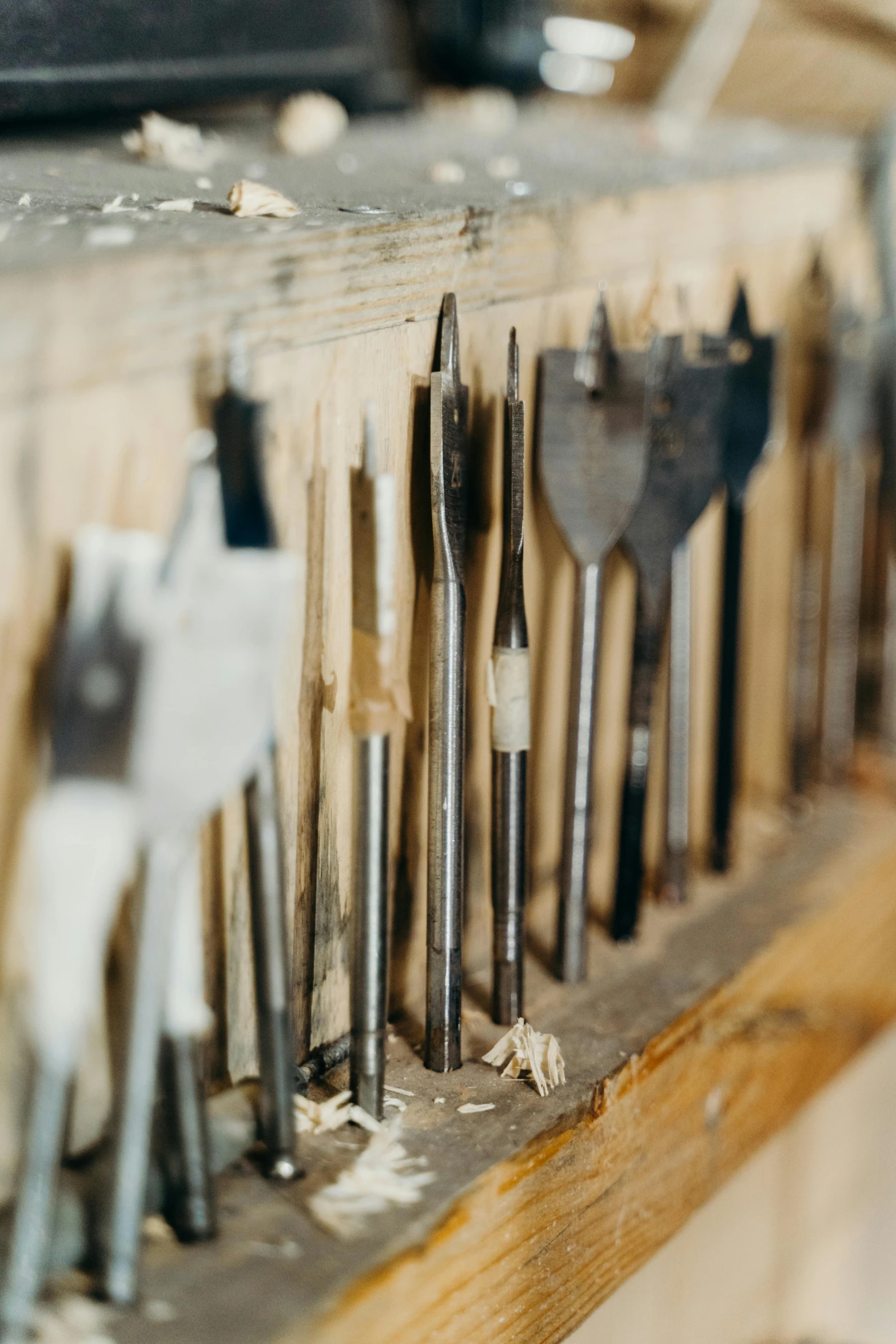 many tools are lined up on a shelf