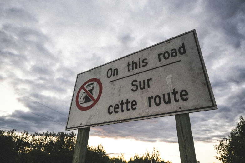 a sign that has been altered to look like the end of the road