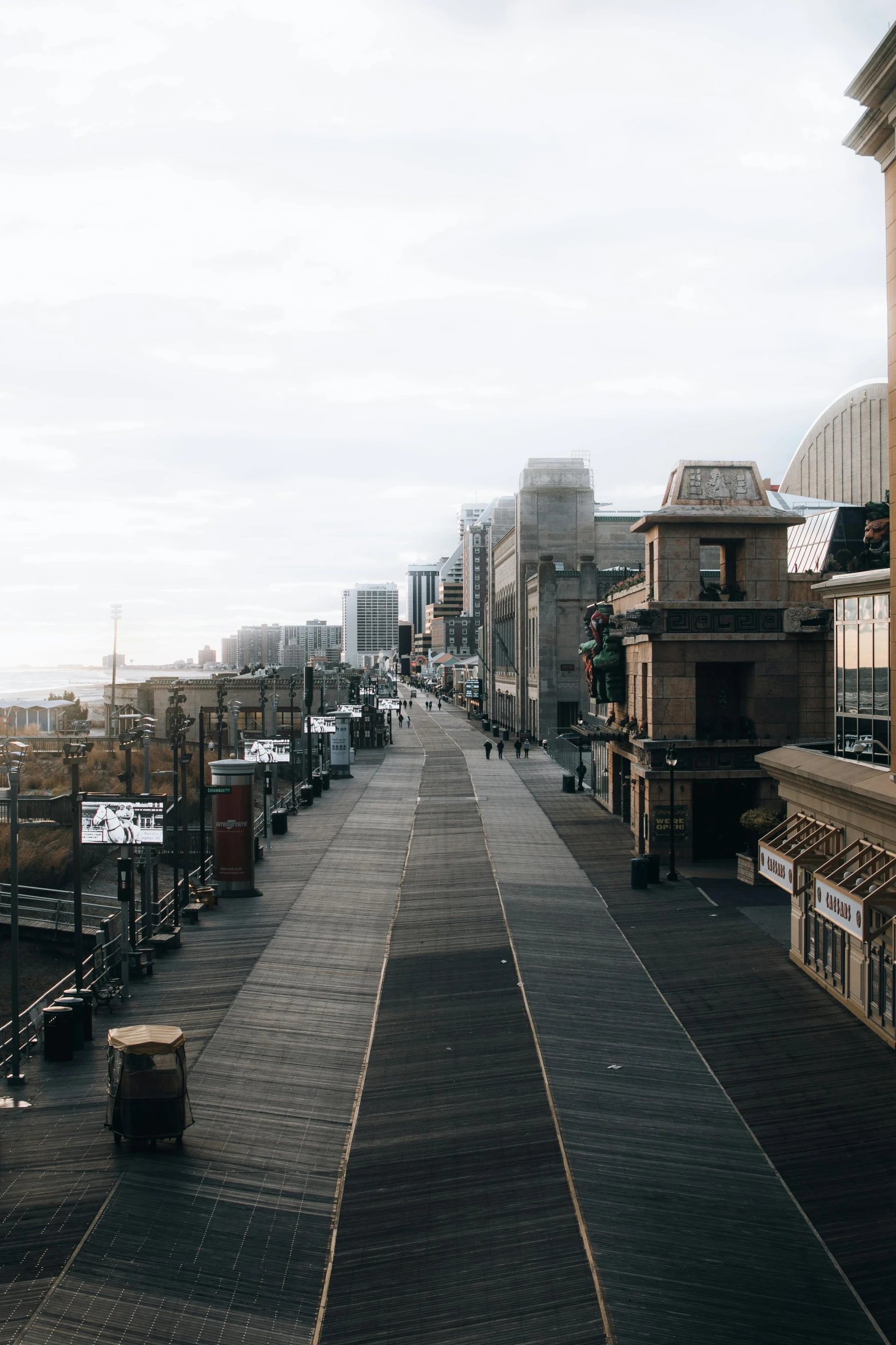 an image of street in the city with lots of parked cars