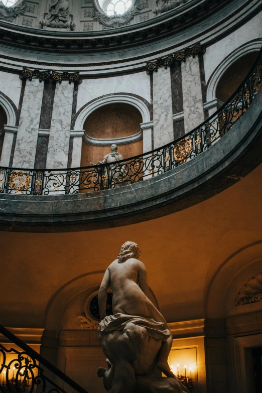 a tall statue inside of a building