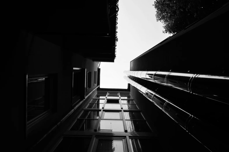 a view looking up at the roof of a building