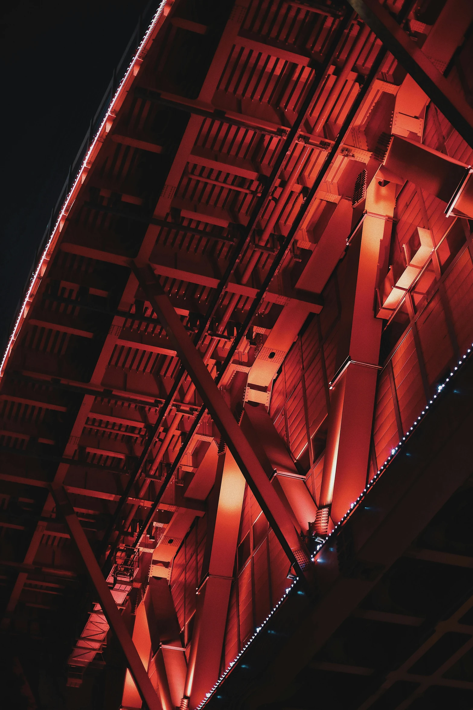 the top of a building lit up with lights