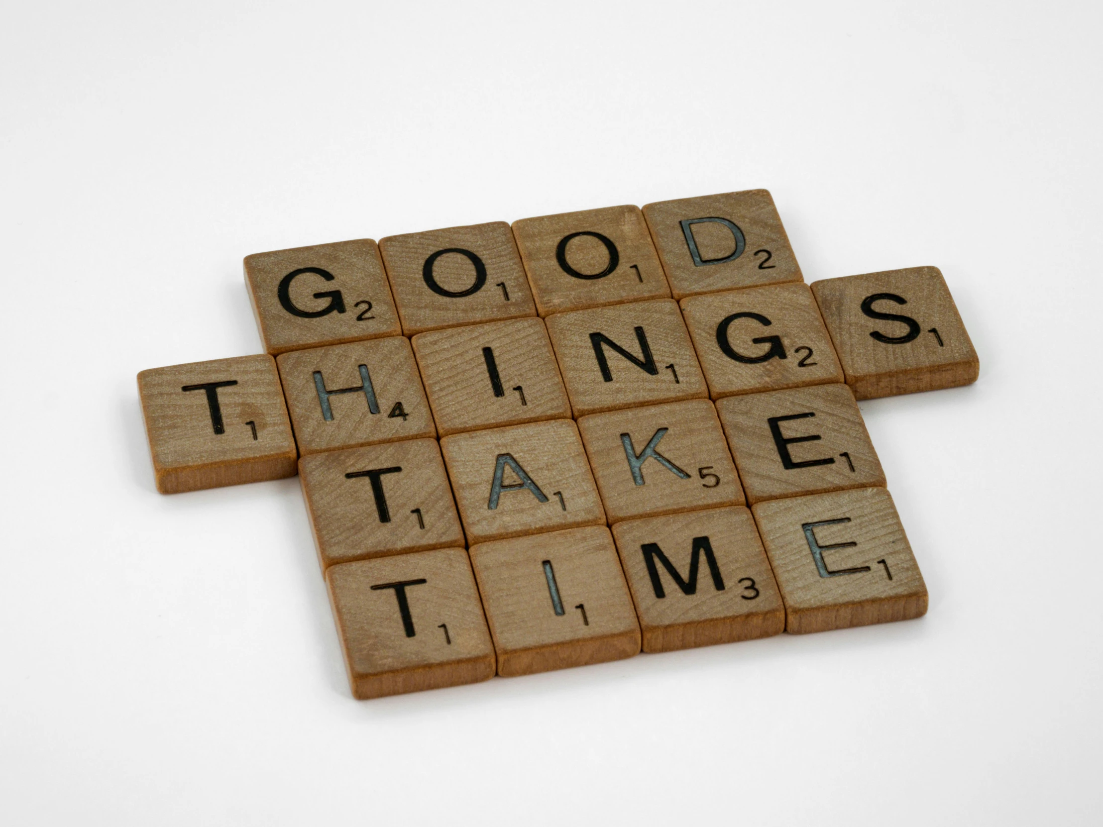 there are wooden blocks that say good things take time