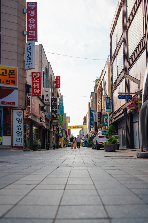 a city filled with tall buildings and lots of signs