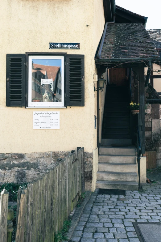 a building with a bunch of windows and stairs