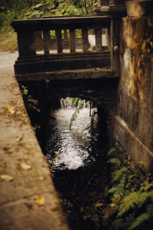 a bridge that is on the side of a road