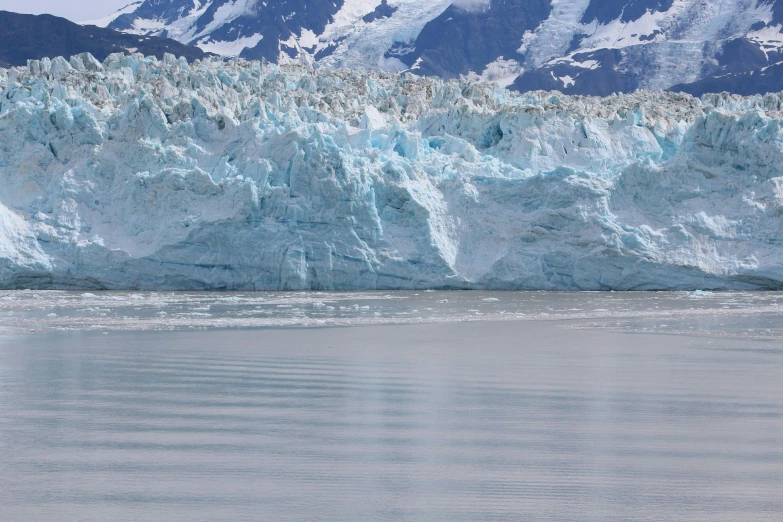 a view of some very tall glacier mountains