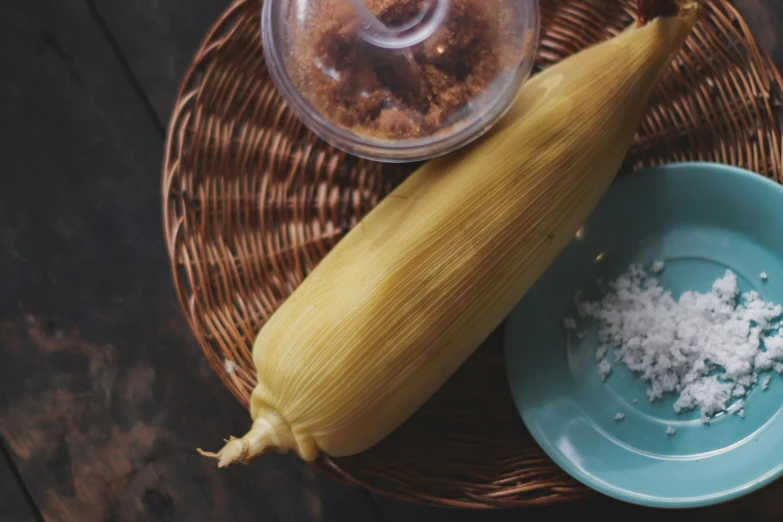 a close up of a banana and a bowl