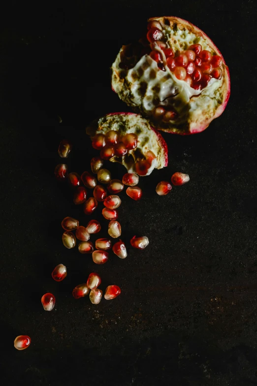 a piece of fruit is shown on a dark surface