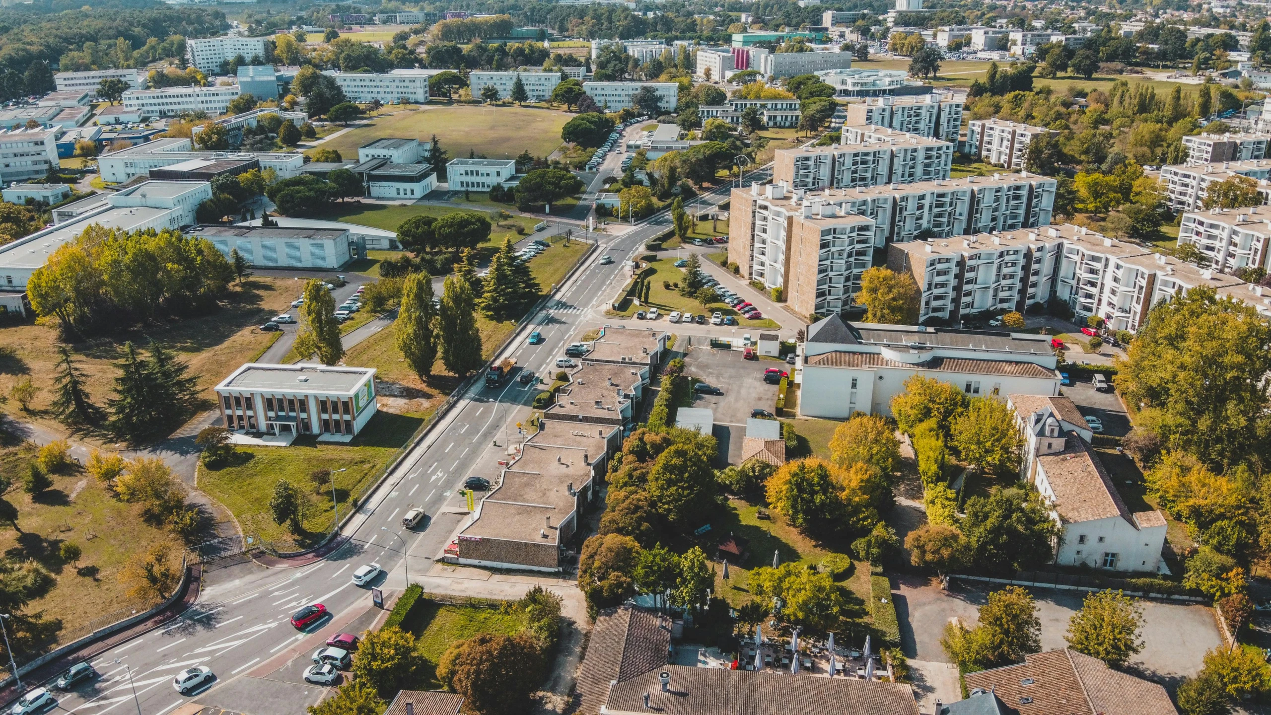 an aerial view of a city street with buildings