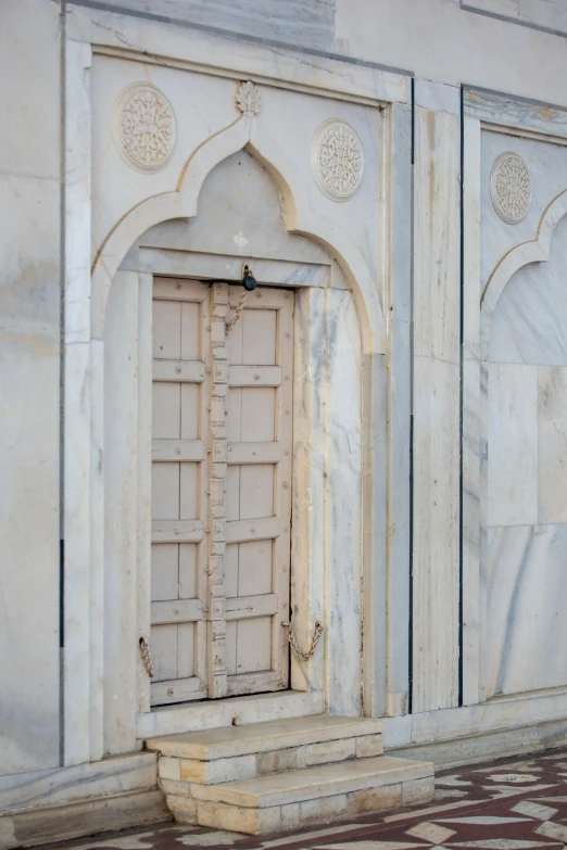 an old building with a wooden door