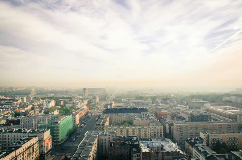 an aerial view of buildings and streets in a large city