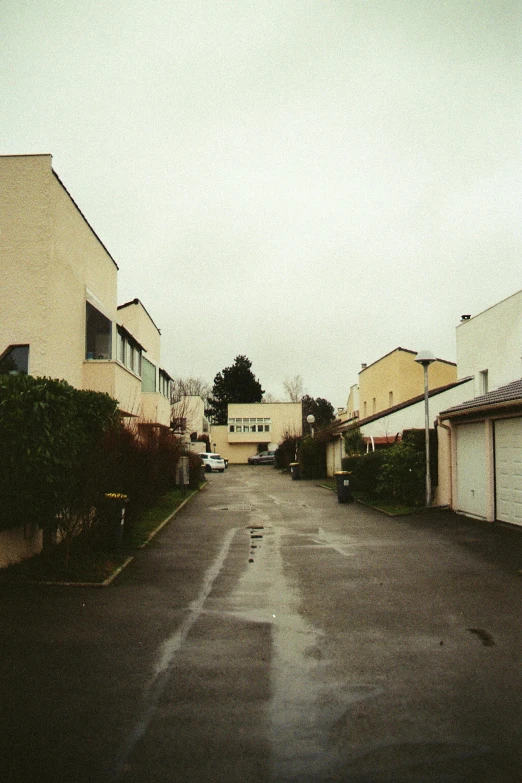 a po of an empty street and houses