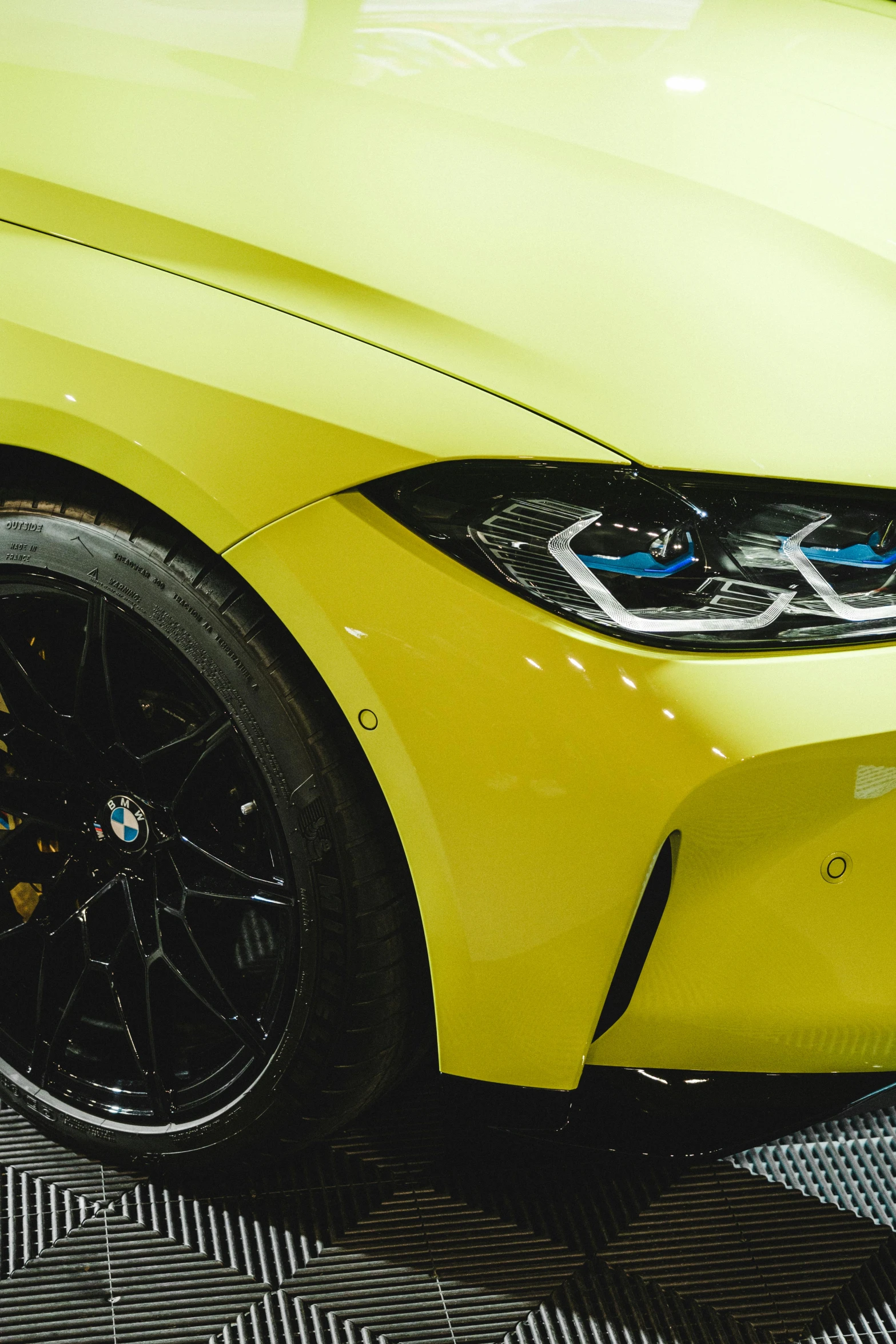 a close up of a vehicle in a garage