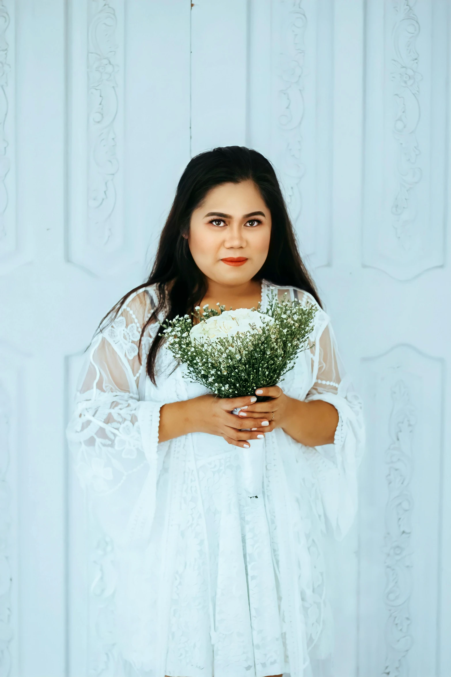 an image of a girl with flowers in her hand