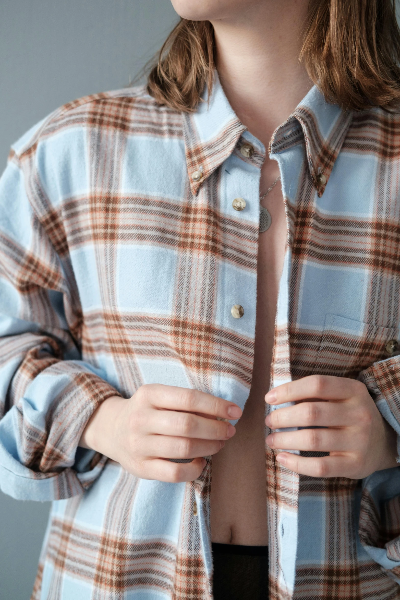 a close up po of a person wearing a shirt