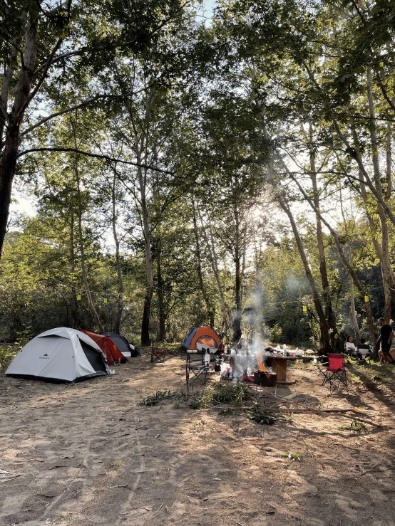 a camp ground is filled with camping tents