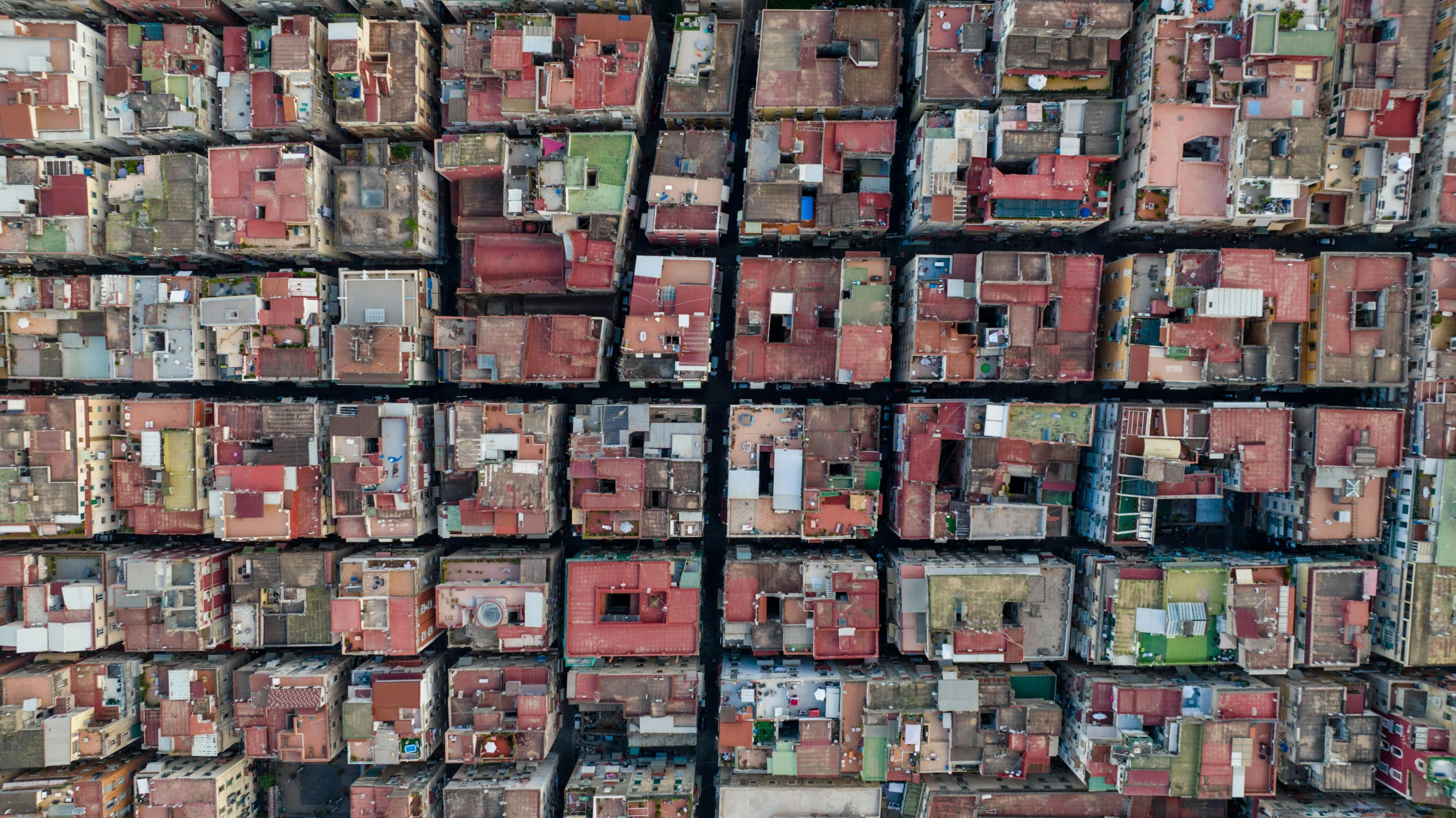 aerial view of a large city area with rows of houses