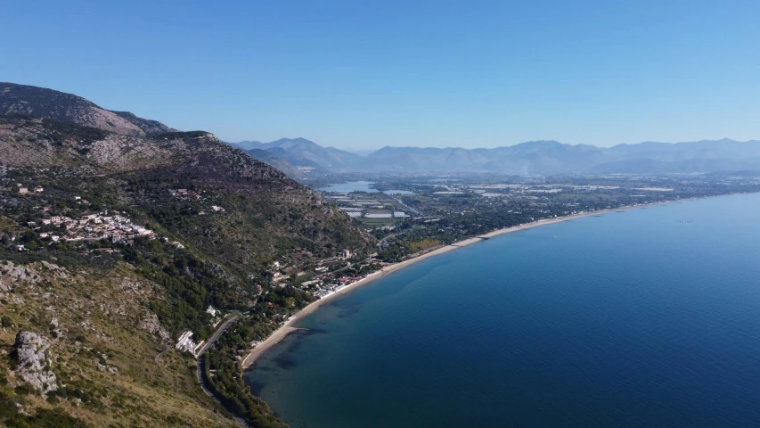 a view of a bay with some mountains in the distance