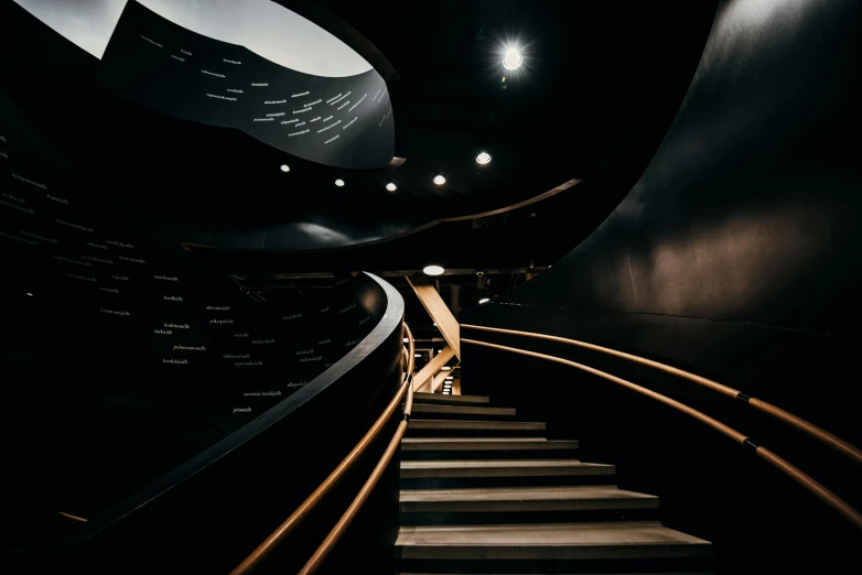 the stairs leading up to the second floor in a building