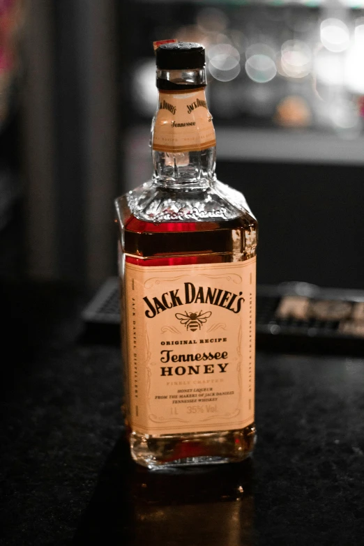 a bottle of jack daniels tennessee honey on a table